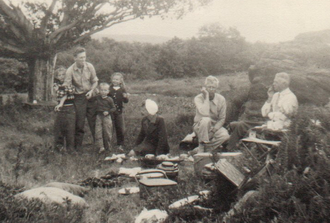 Mark Purinton, the Bauerleins,and Robert Strong Woodward having a picnic under the beech tree in the Heath blueberry pasture. 
